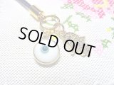 【ＳＯＬＤ　ＯＵＴ　ありがとうございました！】ハムサ・イーブルアイ携帯ストラップ（白・ゴールド）