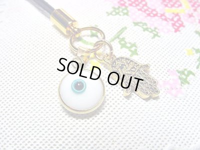 画像1: 【ＳＯＬＤ　ＯＵＴ　ありがとうございました！】ハムサ・イーブルアイ携帯ストラップ（白・ゴールド）