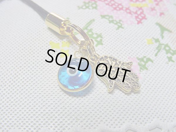 画像1: 【ＳＯＬＤ　ＯＵＴ　ありがとうございました！】ハムサ・イーブルアイ携帯ストラップ（水色・ゴールド）